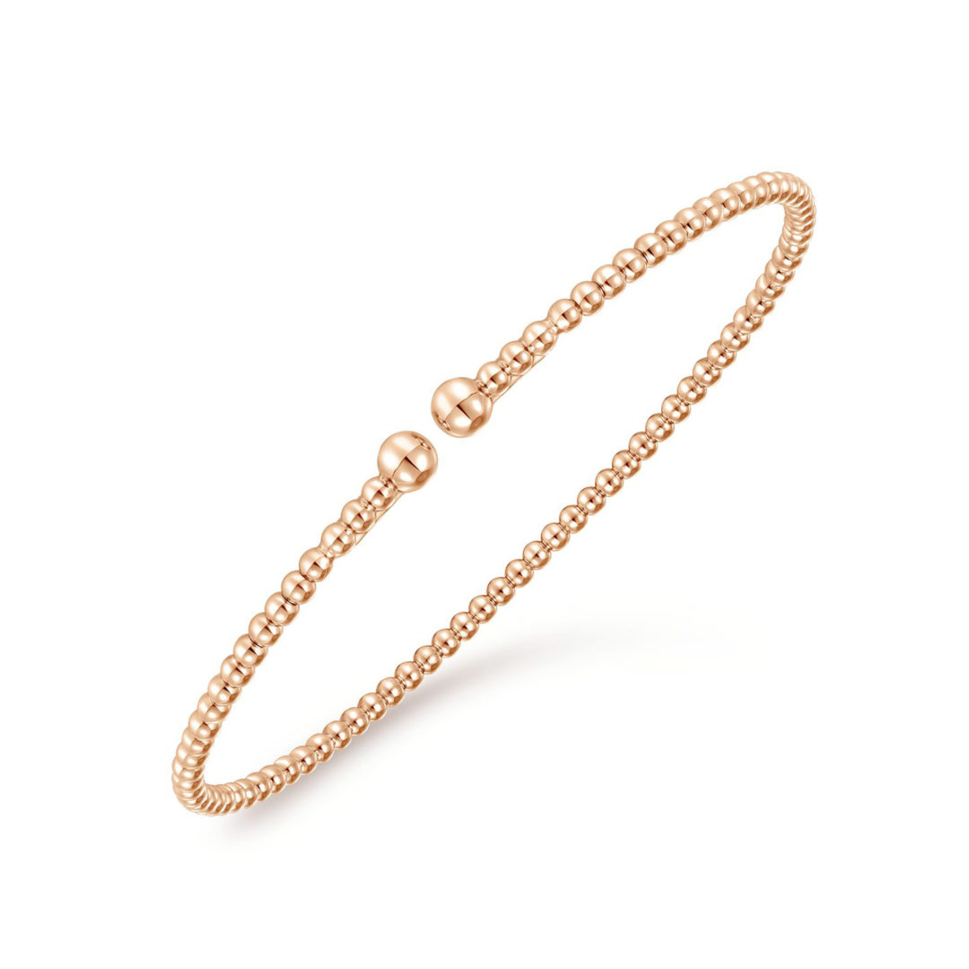 Side View of the Bujukan Bangle in 14k Pink Gold